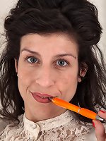 Hairy milf in black stockings plays naughty on cam